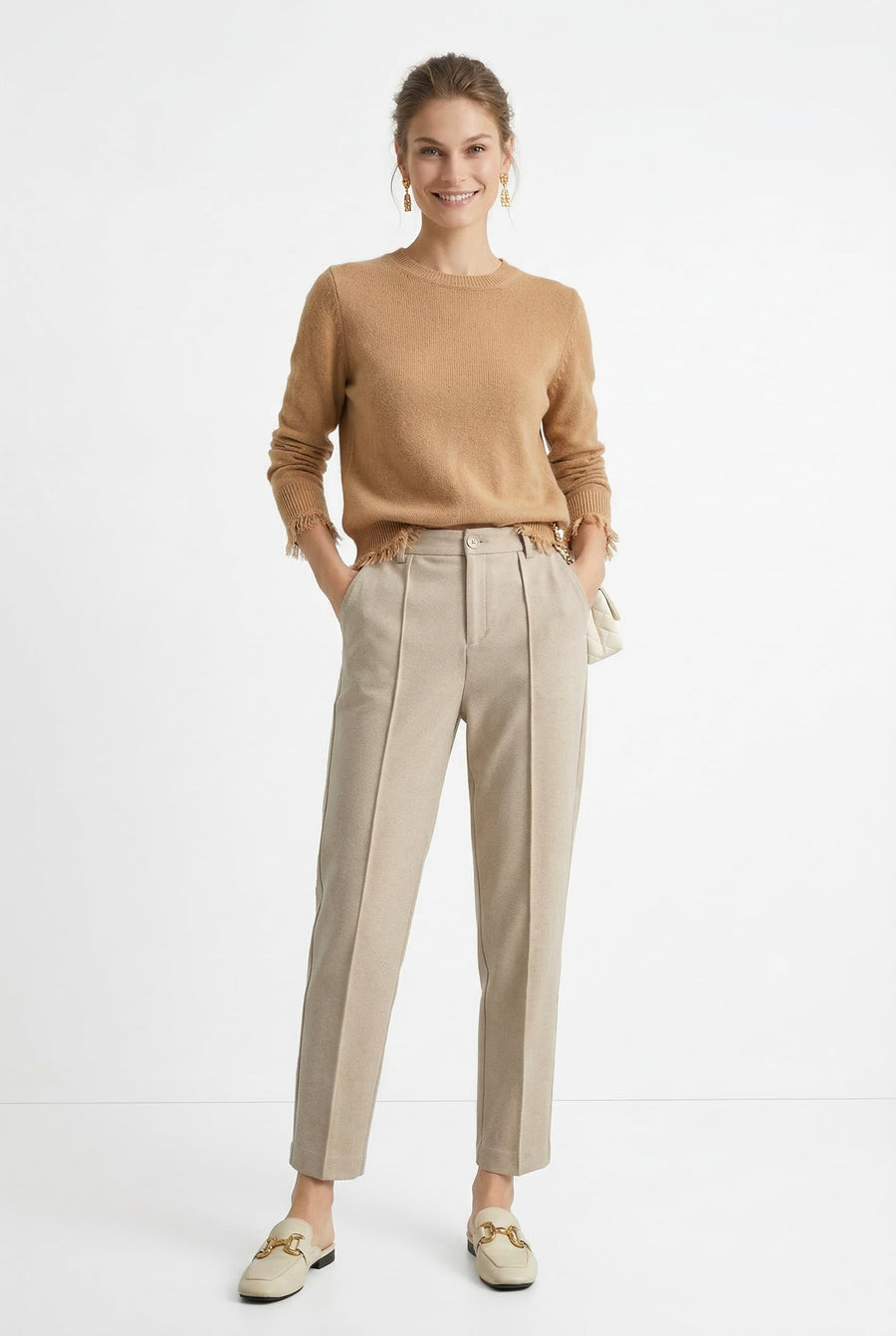 Women's wool tapered trousers by Christine Brewer, featuring a classic fit and smooth merino wool fabric.