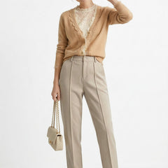Women’s wool tapered trousers by Christine Brewer, featuring a classic fit and cozy merino wool fabric, shown in a stylish outfit.