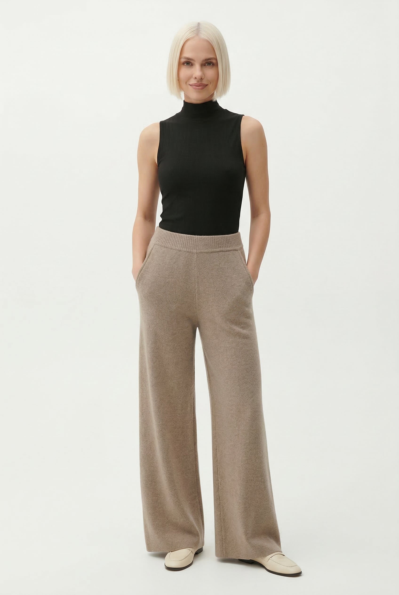 Women’s loose pull-on joggers by Christine Brewer, comfortable casual pants with a relaxed fit, shown in a stylish outfit.