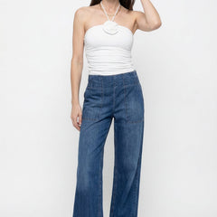 Blue denim wide-leg women's jeans from Christine Brewer, featuring a relaxed fit and casual style, shown on a model.