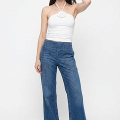 Blue denim wide-leg women's jeans by Christine Brewer, featuring a relaxed fit and casual style in the image.