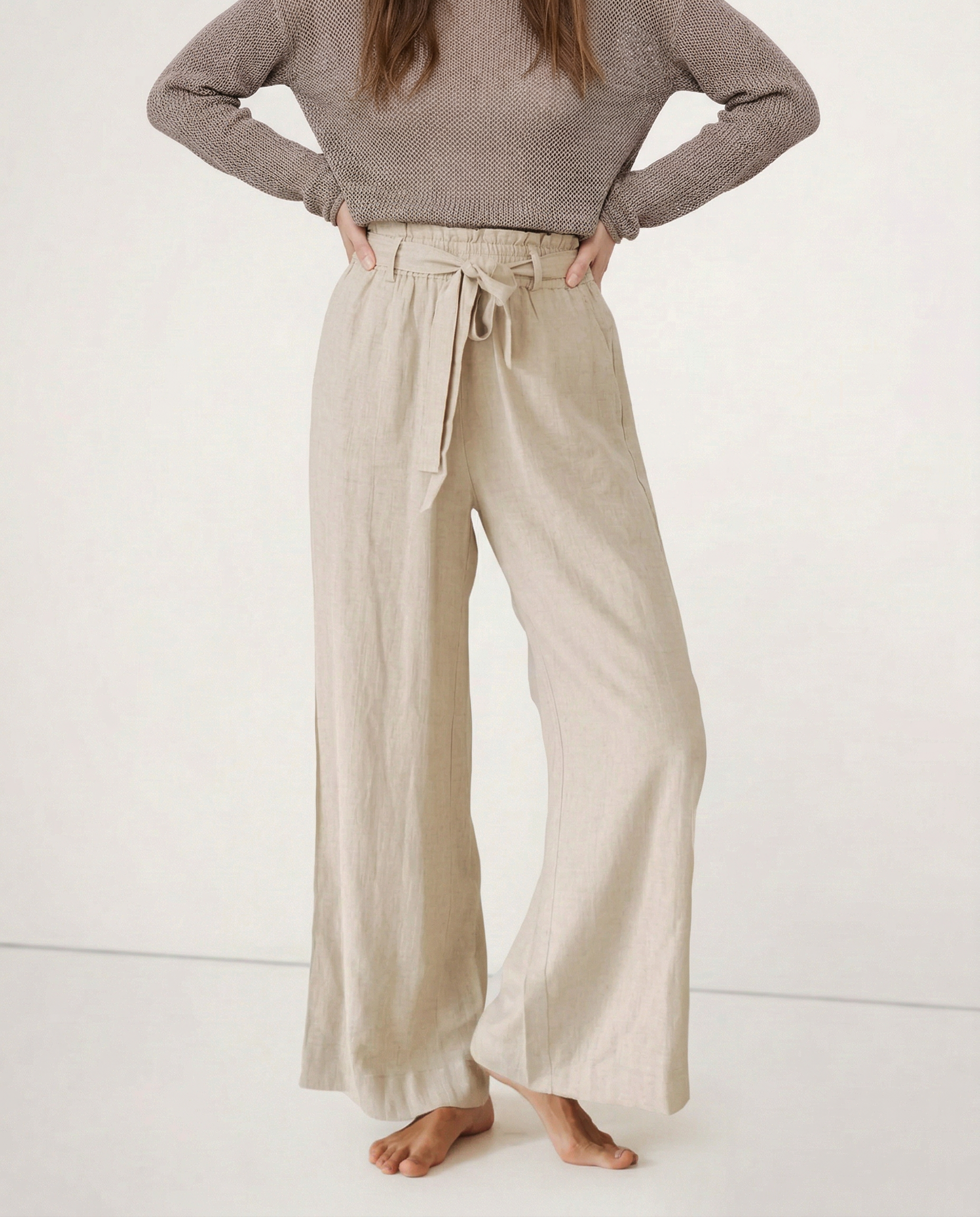 Christine Brewer linen wide-leg trousers for women, loose pull-on pants showcasing soft, textured fabric and relaxed fit.