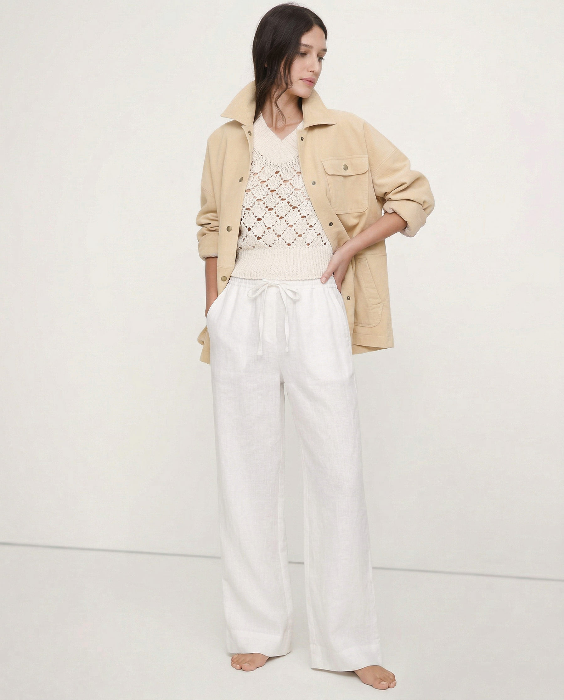Women’s linen wide-leg trousers by Christine Brewer, loose pull-on pants showcasing soft fabric and comfortable fit.