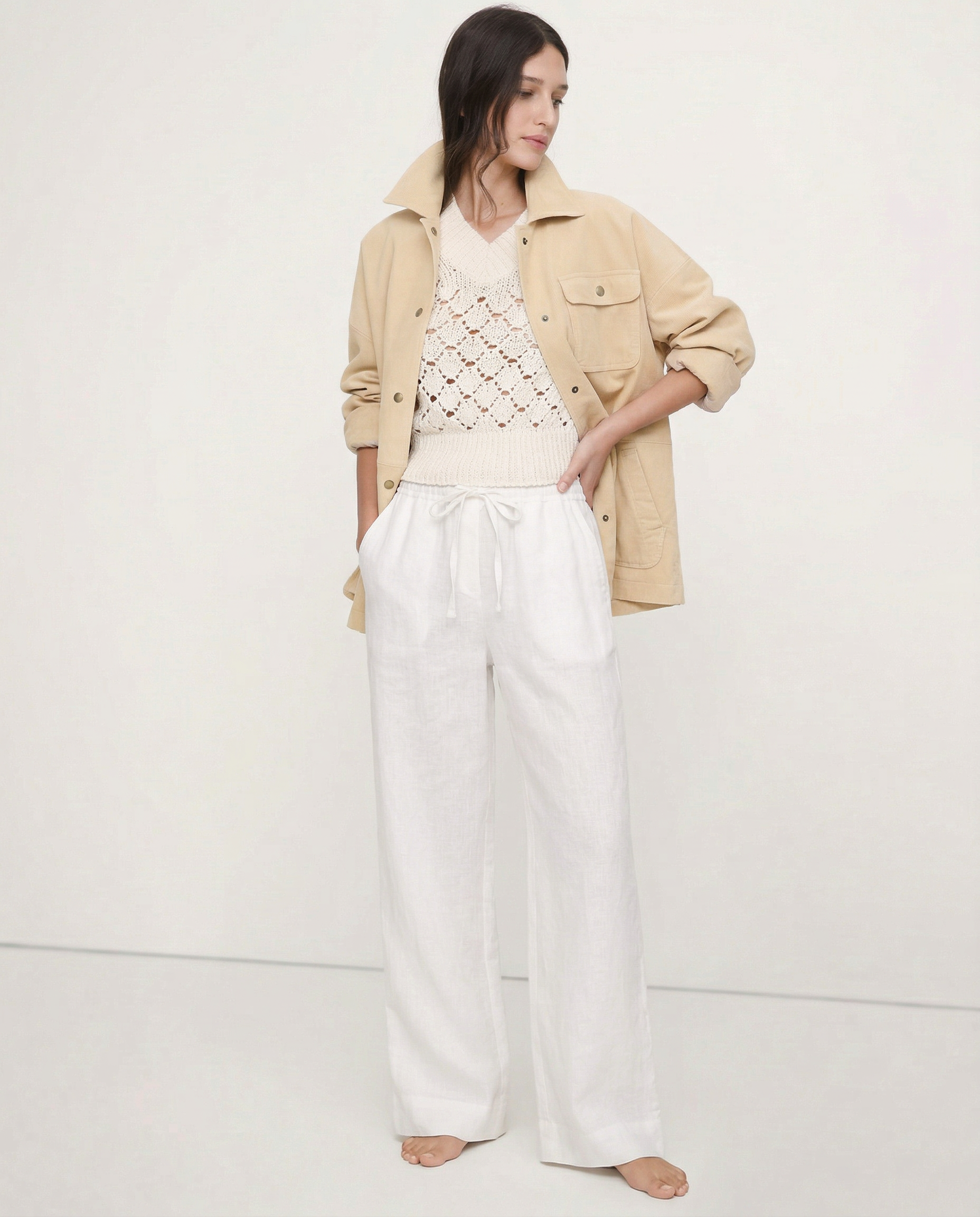 Women’s linen wide-leg trousers by Christine Brewer, loose pull-on pants showcasing soft fabric and comfortable fit.