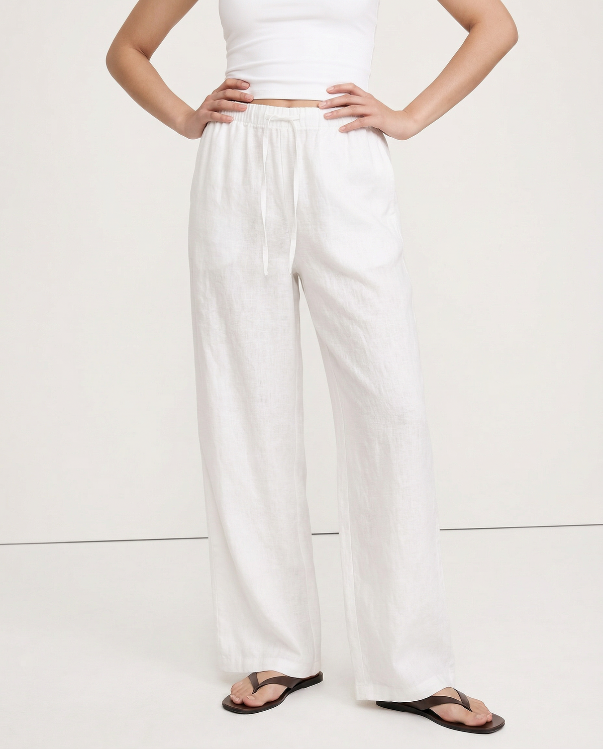 Knit wide-leg drawstring trousers for women by Christine Brewer, showing comfortable loose fit and quality fabric.