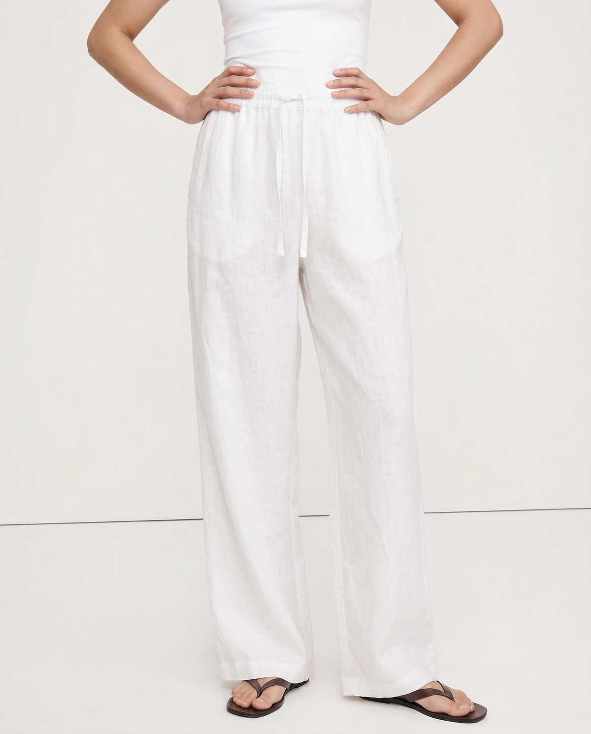 Women’s knit wide-leg drawstring trousers by Christine Brewer, featuring loose, pull-on style and soft fabric quality.