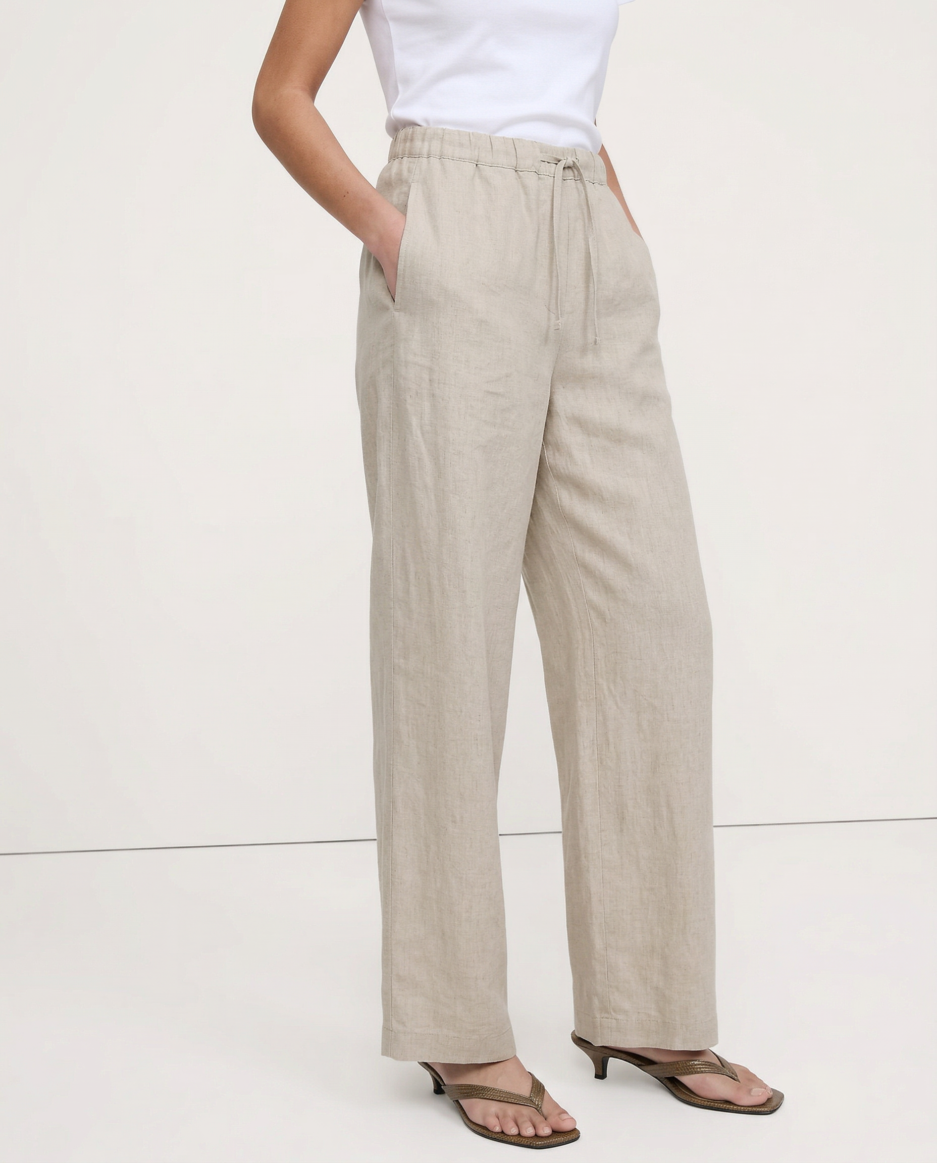 Knit wide-leg drawstring trousers for women by Christine Brewer, featuring loose fit, pull-on style, and soft fabric.