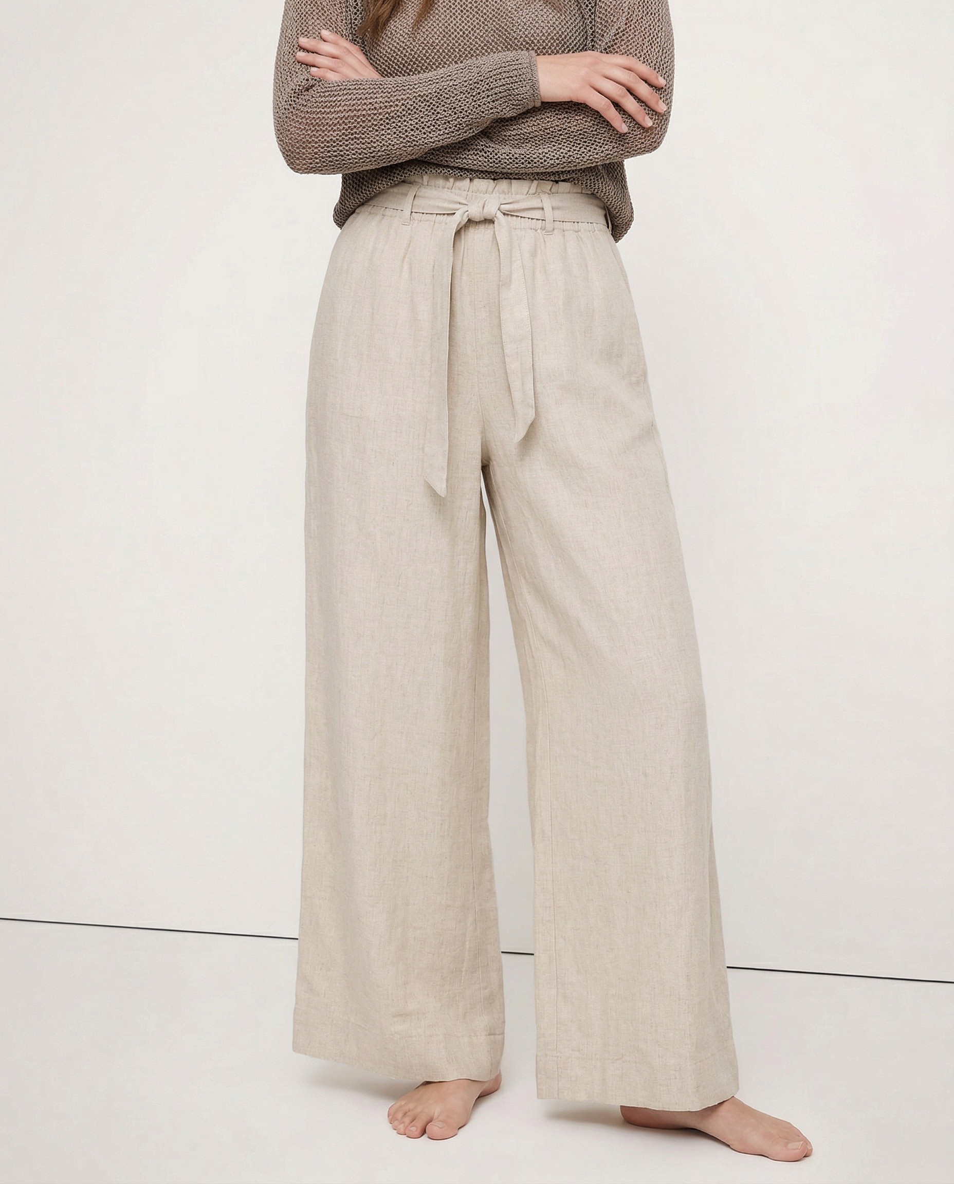 Women’s linen wide-leg trousers by Christine Brewer, loose pull-on pants showcasing breathable fabric and comfortable fit.