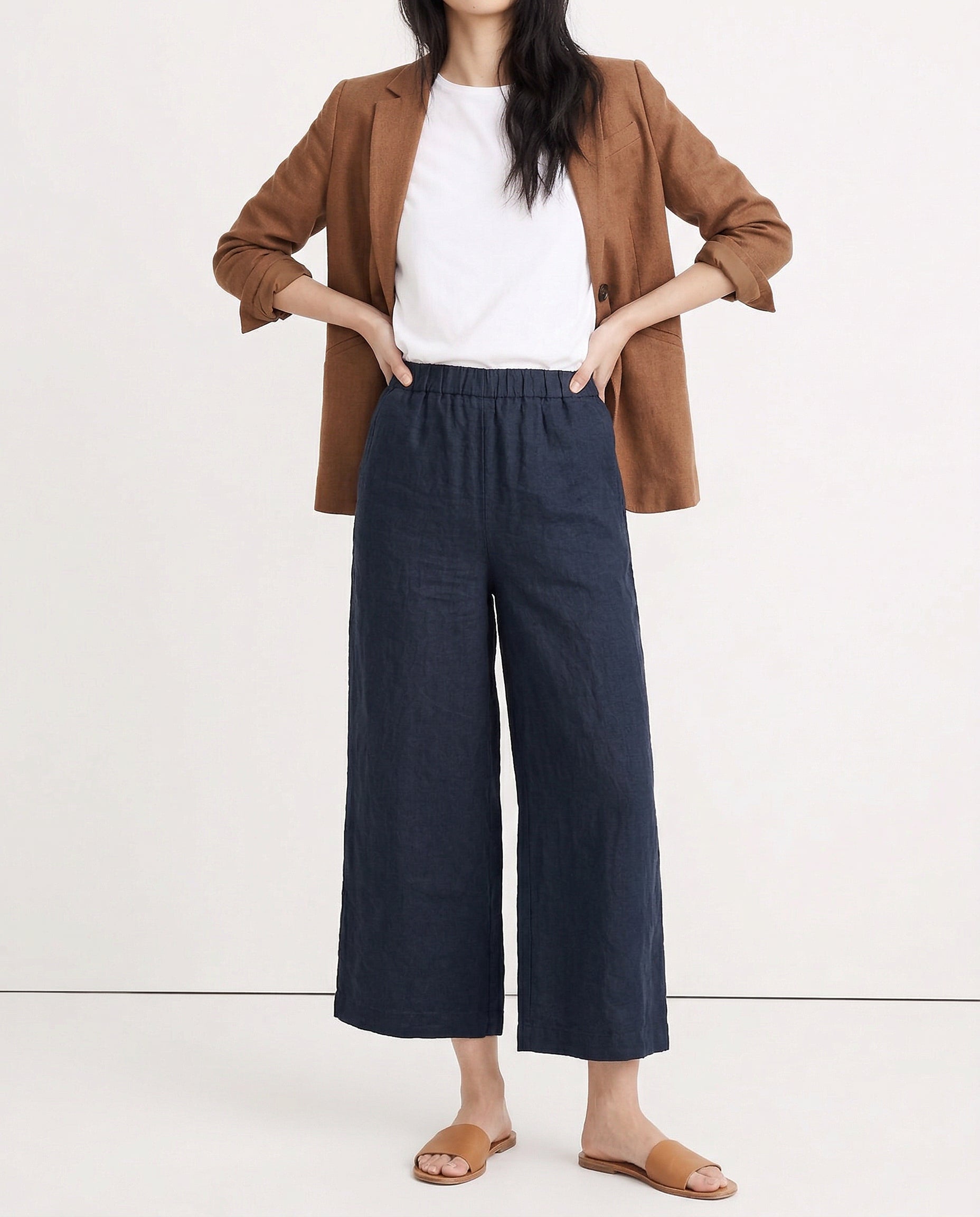Linen cropped wide-leg drawstring trousers for women by Christine Brewer, showing the quality and texture of the fabric.