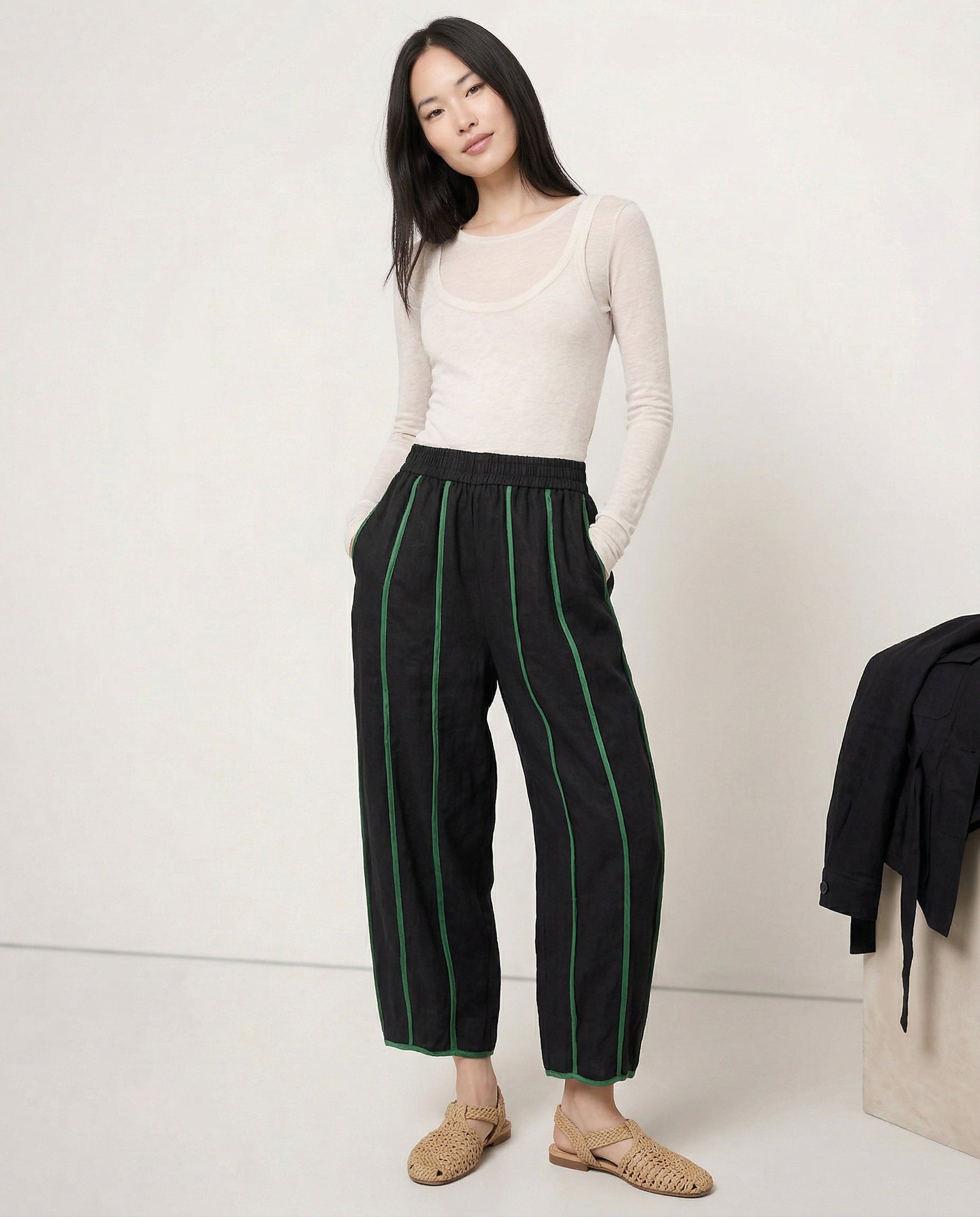 Women’s linen wide-leg elastic-waist trousers by Christine Brewer, shown in a realistic image highlighting the high-quality linen fabric.