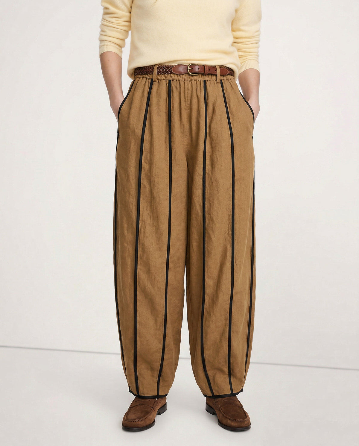 Women’s linen wide-leg elastic-waist trousers by Christine Brewer, showing soft, high-quality fabric and relaxed fit.