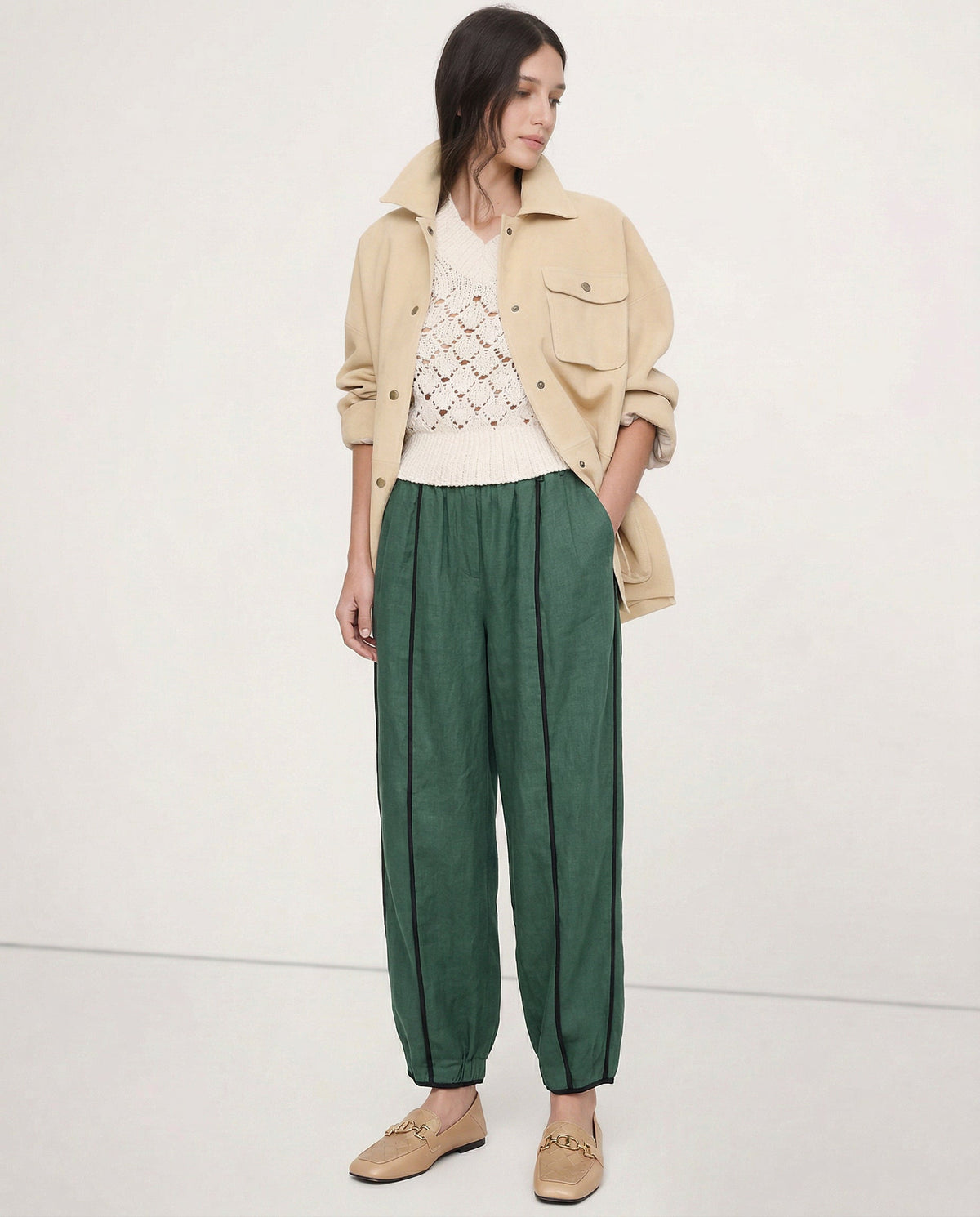 Women’s linen wide-leg elastic-waist trousers by Christine Brewer, showcasing the soft, high-quality linen fabric and relaxed fit.