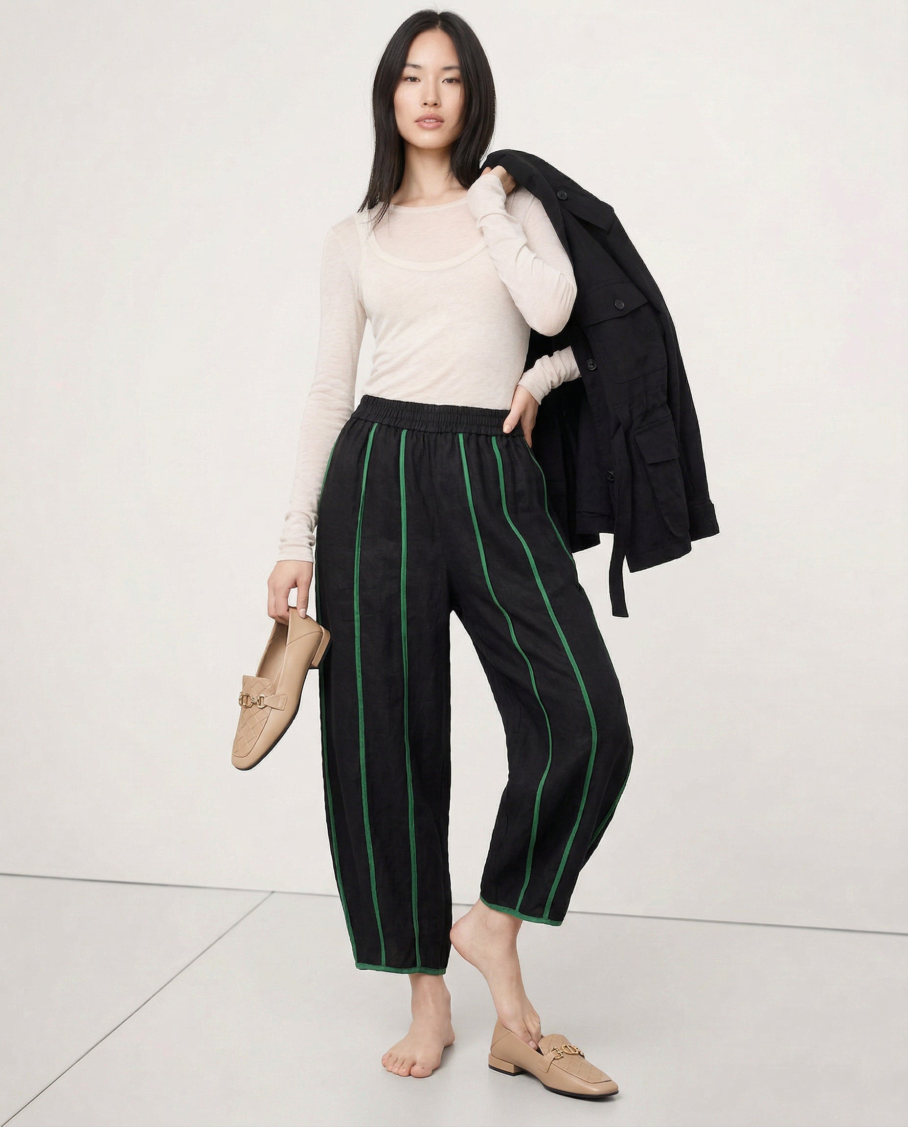 Women’s linen wide-leg elastic-waist trousers by Christine Brewer, featuring a relaxed fit and high-quality linen fabric.