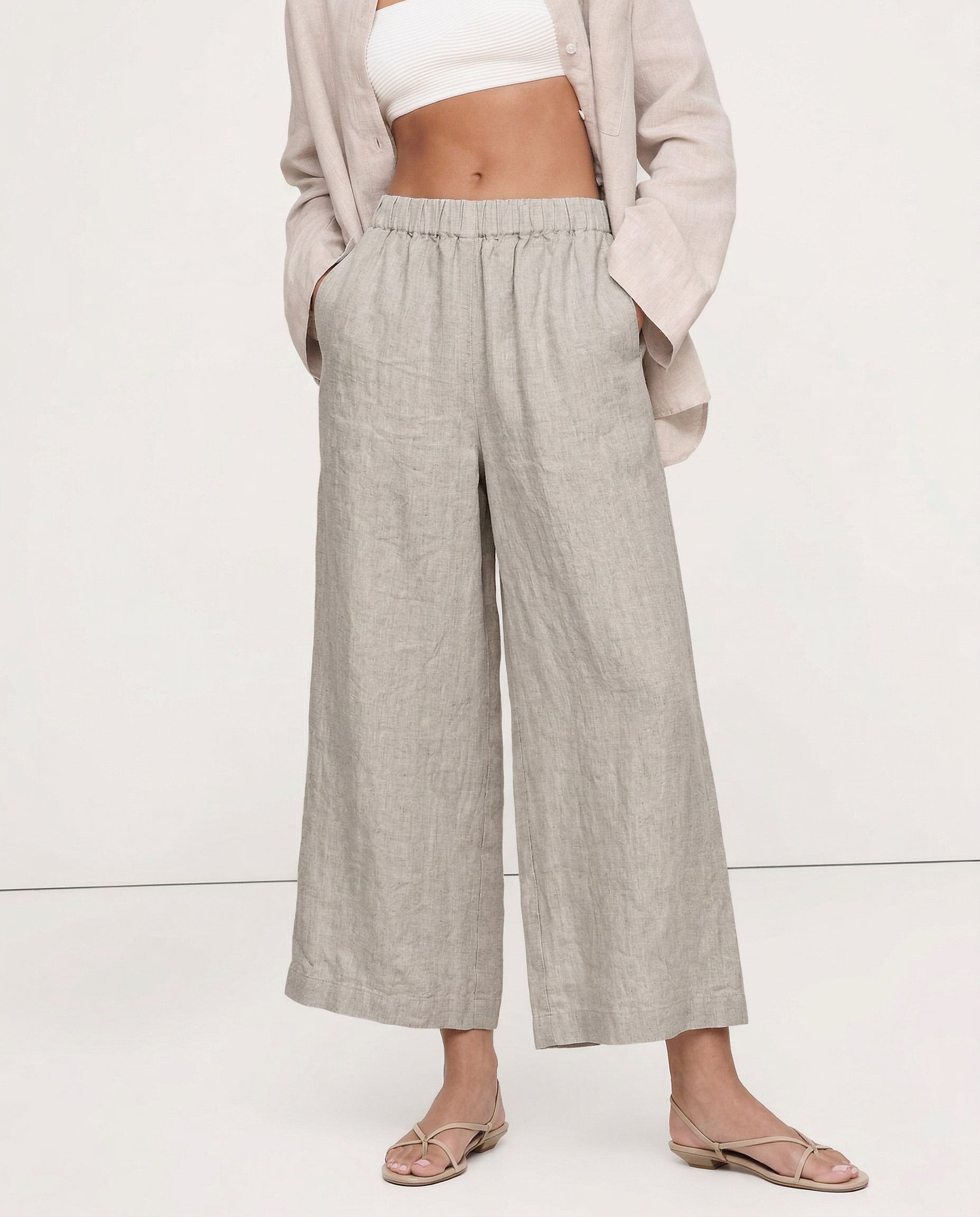 Women’s linen cropped wide-leg drawstring trousers by Christine Brewer, showing the high-quality, breathable linen fabric.