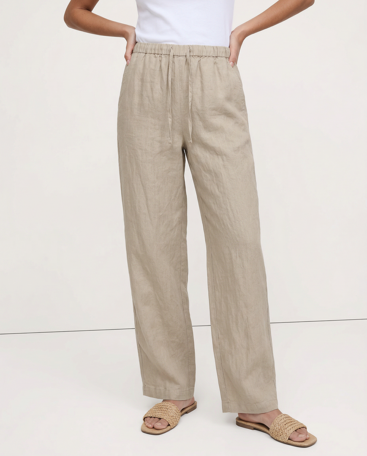 Women’s knit wide-leg drawstring trousers by Christine Brewer, featuring a loose, pull-on style and comfortable fit.