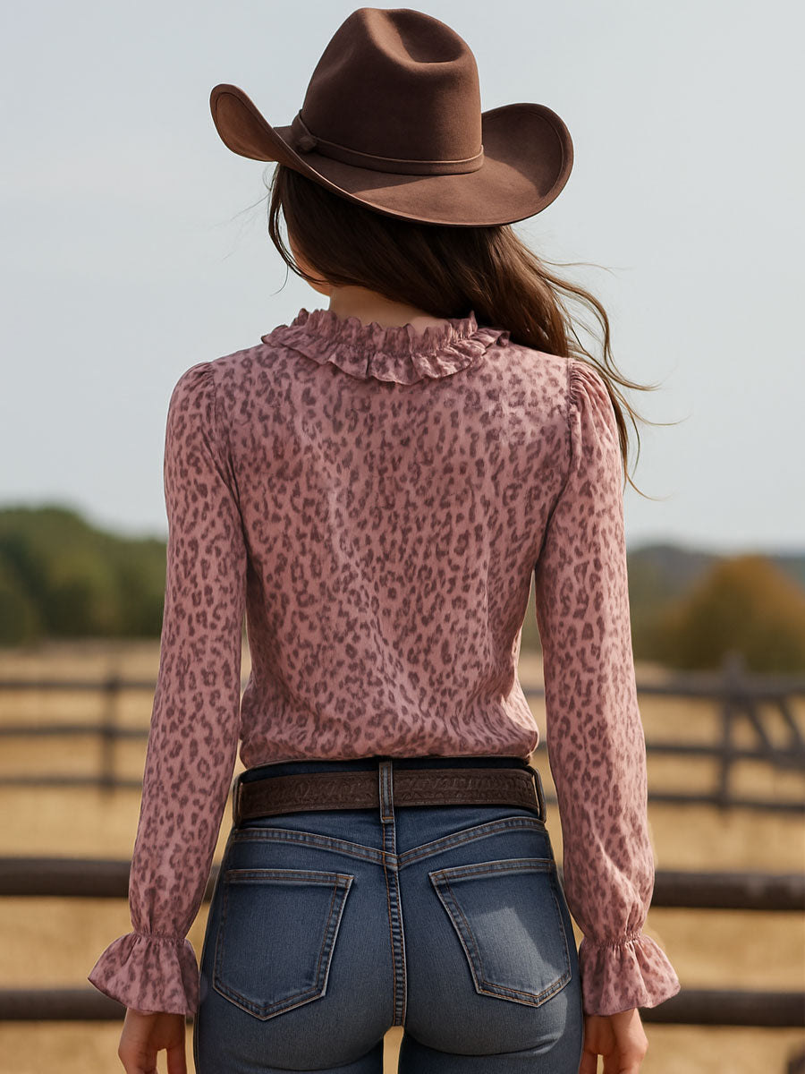 Pink leopard print chiffon blouse with ruffled lace V-neck, stylish and feminine, by Christine Brewer.