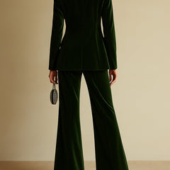 Emerald green loose velvet two-piece suit set for women featuring stylish pants by Christine Brewer.