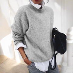 Gray knit sweater for women by Christine Brewer, featuring a cozy, textured design perfect for casual wear.