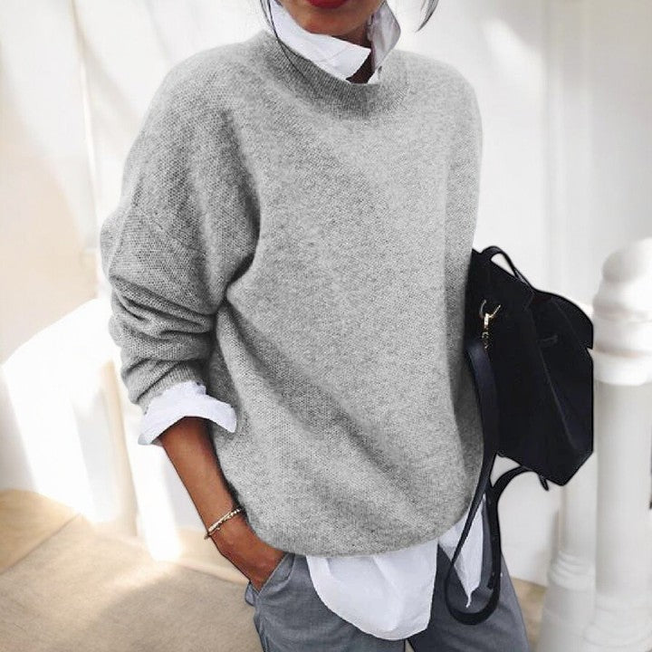 Gray knit sweater for women by Christine Brewer, featuring a cozy, textured design perfect for casual wear.