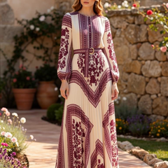 Boho printed long sleeve maxi dress by Christine Brewer featuring a relaxed fit and vibrant floral pattern.