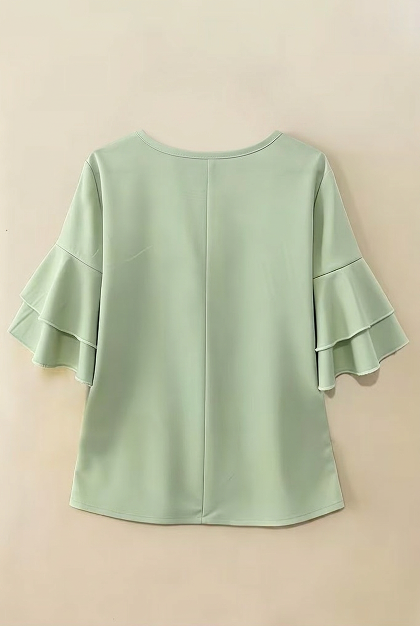 Sophia button-front top for women by Christine Brewer, featuring a stylish design and button details, shown on a white background.