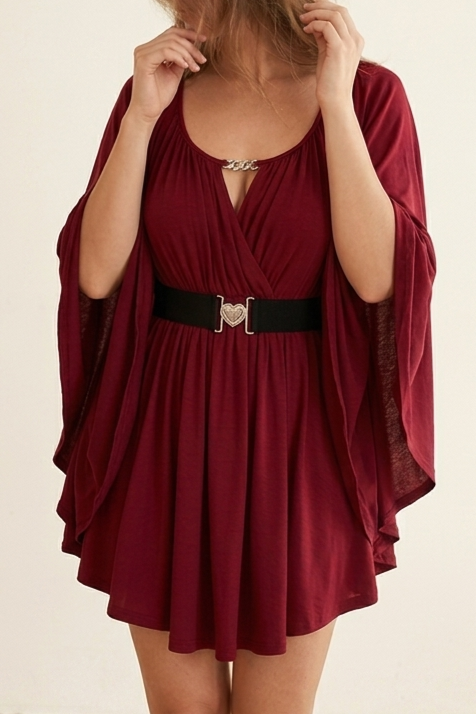 Olivia V-neck top for women by Christine Brewer, featuring a fitted design and soft fabric in a neutral color.