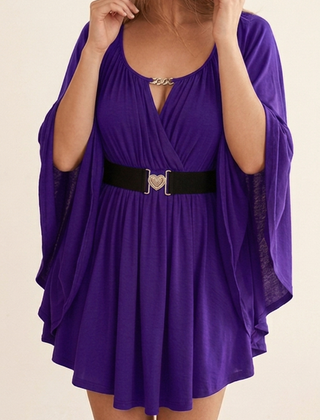 Olivia V-neck top for women by Christine Brewer, featuring a fitted design and soft fabric in a neutral color.