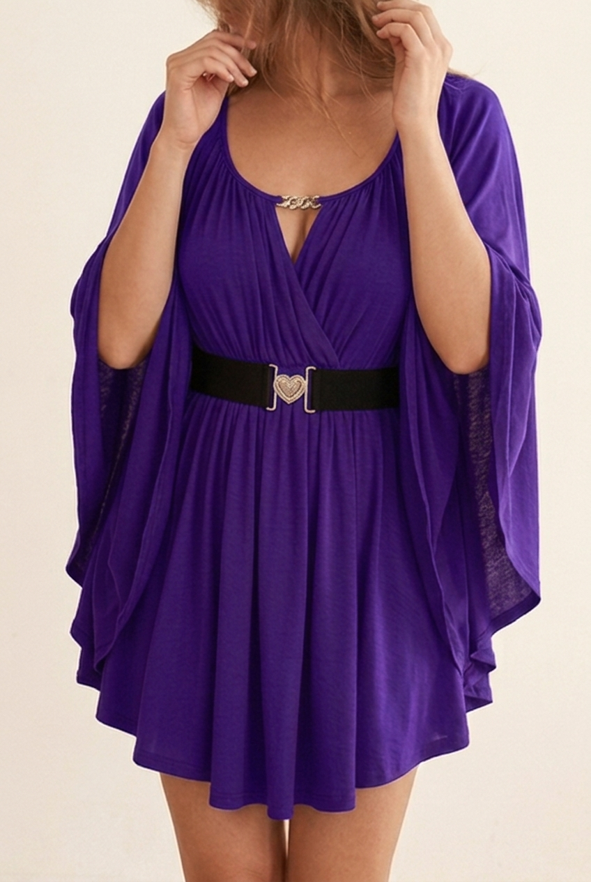 Olivia V-neck top for women by Christine Brewer, featuring a fitted design and soft fabric in a neutral color.
