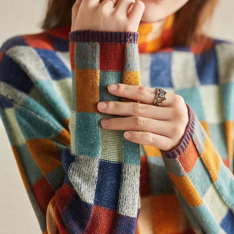 Women’s knit sweater from Christine Brewer’s Georgia collection, featuring a cozy, stylish design in soft fabric.