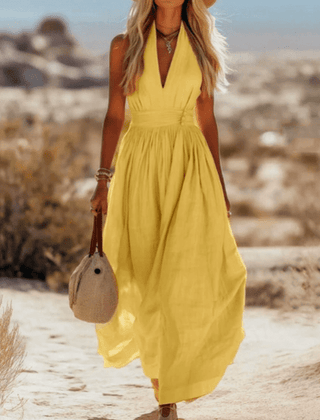 Elegant sleeveless cotton maxi dress for women by Christine Brewer, featuring a flowing design and comfortable fit.
