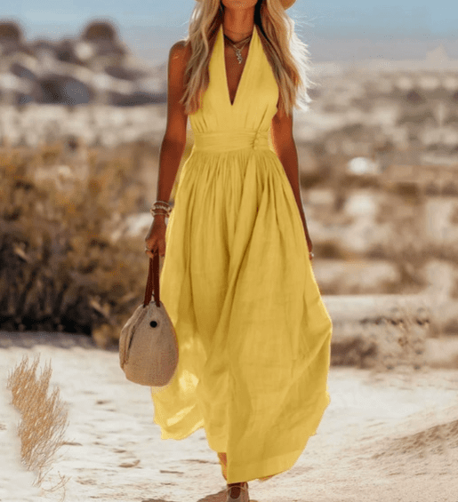 Elegant sleeveless cotton maxi dress for women by Christine Brewer, featuring a flowing design and comfortable fit.
