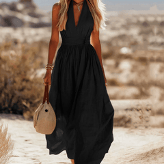 Sleeveless cotton maxi dress for women by Christine Brewer, featuring a flowing design and lightweight fabric for summer wear.