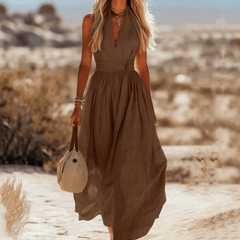 Sleeveless cotton maxi dress for women by Christine Brewer, featuring a flowing design and breathable fabric, ideal for summer wear.