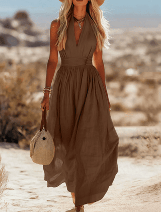 Sleeveless cotton maxi dress for women by Christine Brewer, featuring a flowing design and breathable fabric, ideal for summer wear.