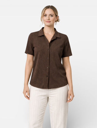 Women's short sleeve button-up shirt by Christine Brewer, classic fit, featuring a collar and front buttons, in a versatile style.