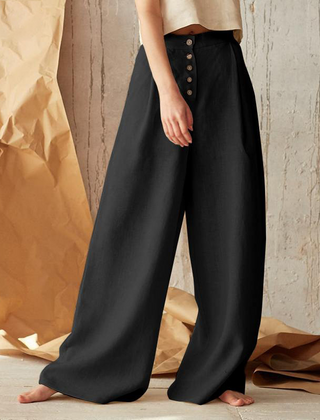 Christine Brewer women's knit wide-leg elastic-waist trousers with a loose pull-on style, shown in a relaxed fit.