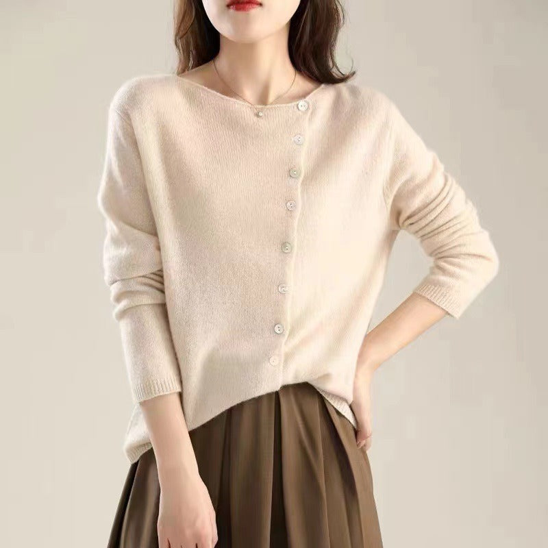 Pink knit sweater for women by Christine Brewer featuring a cozy, soft fabric and a classic crew neckline.