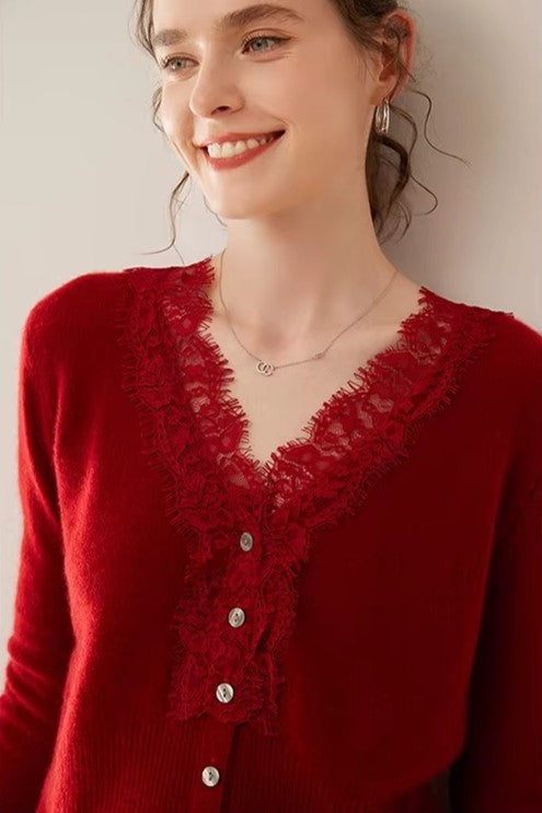 Elsa cashmere cardigan for women by Christine Brewer, soft beige knit with button closure, displayed on a neutral background.