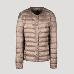 Beige Lily quilted puffer jacket for women by Christine Brewer, lightweight with a quilted design and cozy collar.