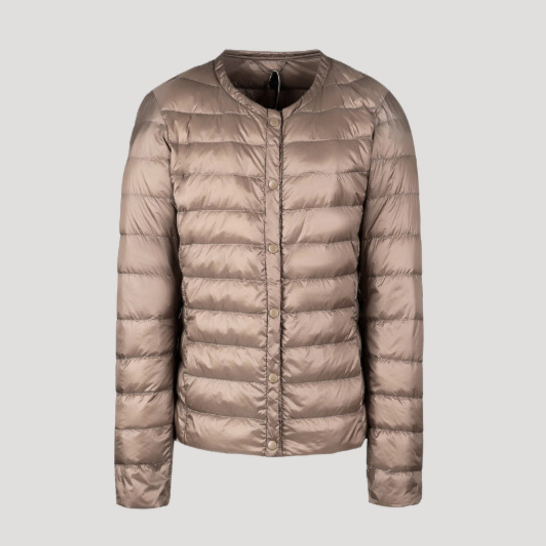 Beige Lily quilted puffer jacket for women by Christine Brewer, lightweight with a quilted design and cozy collar.