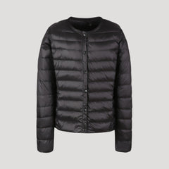 Black Ingrid lightweight quilted puffer jacket for women by Christine Brewer, featuring a cozy, padded design and stylish silhouette.