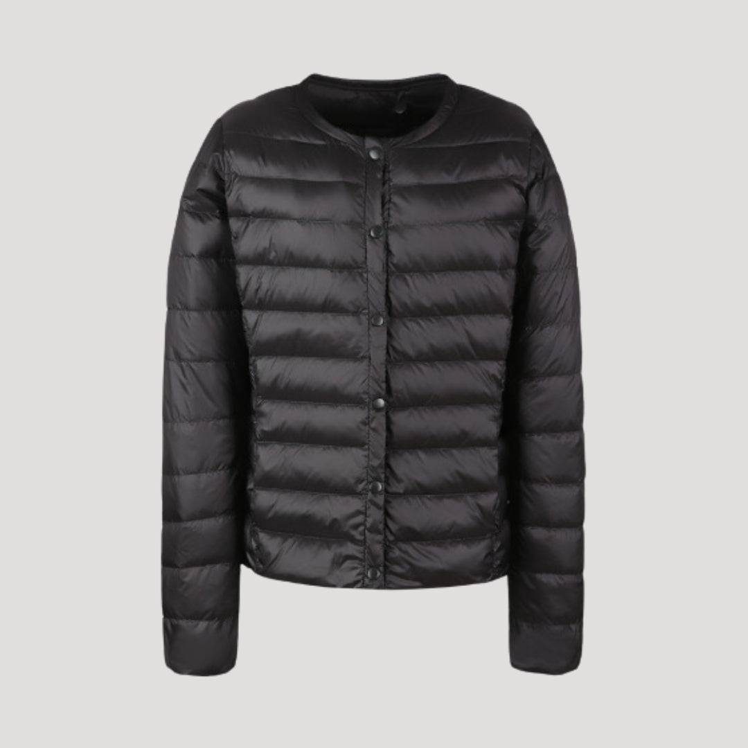 Black Ingrid lightweight quilted puffer jacket for women by Christine Brewer, featuring a cozy, padded design and stylish silhouette.