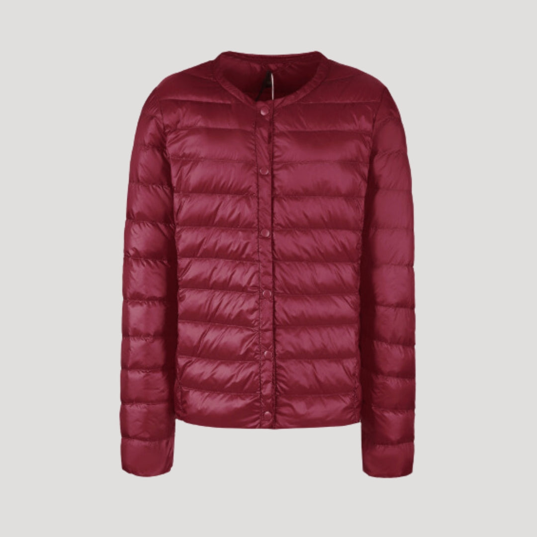 Lightweight quilted puffer jacket for women by Christine Brewer, in a stylish Bordeaux color with a cozy, padded design.