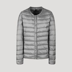 Light gray Lily quilted puffer jacket for women by Christine Brewer, shown with a lightweight, padded design and cozy fit.