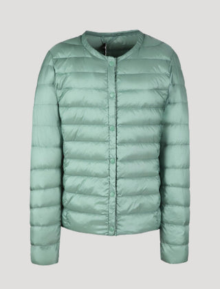 Lightweight green quilted puffer jacket for women by Christine Brewer, featuring a stylish, insulated design suitable for cold weather.