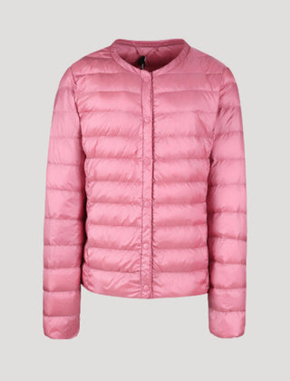 Light pink Ingrid quilted puffer jacket for women by Christine Brewer, featuring lightweight, quilted design and cozy winter style.