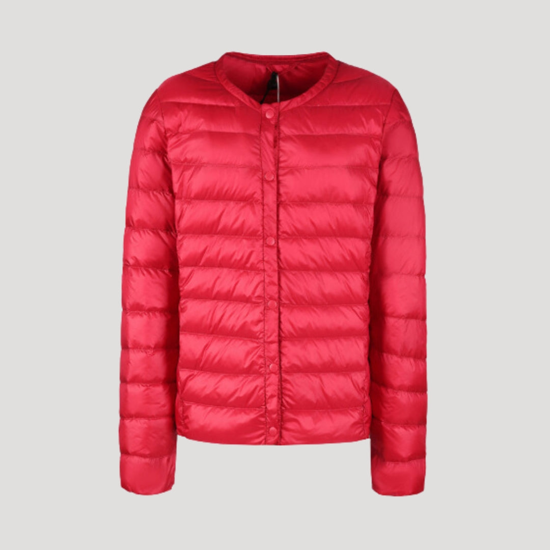 Red Ingrid lightweight quilted puffer jacket for women by Christine Brewer, showcasing a stylish, padded winter jacket.