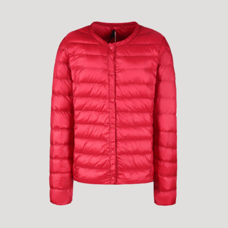 Red Ingrid lightweight quilted puffer jacket for women by Christine Brewer, showcasing a stylish, padded winter jacket.