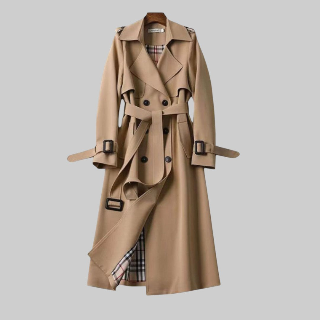 Emily women's belted double-breasted long trench coat by Christine Brewer, shown in Jakarta style with classic design and tailored fit.