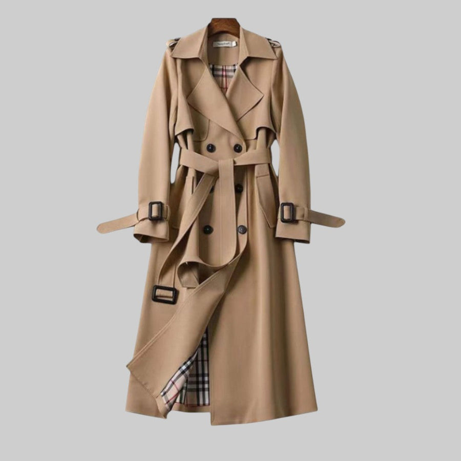 Emily women's belted double-breasted long trench coat by Christine Brewer, shown in Jakarta style with classic design and tailored fit.
